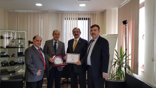 In February, chapter board members pose for a photo with SIMSOFT Company executives (l-r) Zafer Betoner, chapter vice president; Veysi İsler, Simsoft founding member; Kamil Zafer Selcuk, chapter president; and Kadir Temiz, Simsoft Company, deputy general manager.